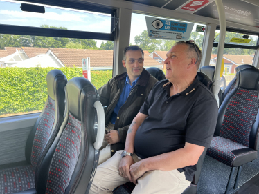 Neil with Cllr Keith Green on the bus