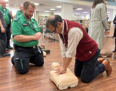 Neil practicing CPR