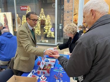 Neil selling poppies